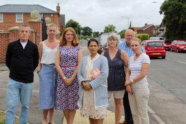 Priti Patel MP (front) with concerned local residents in Copford assessing the nuisance car parking problem. Cllr Janet Maclean, CBC Ward Councillor and Cllr Graham Barney, Chairman of Copford with Easthorpe Parish Council are in the back row, right.